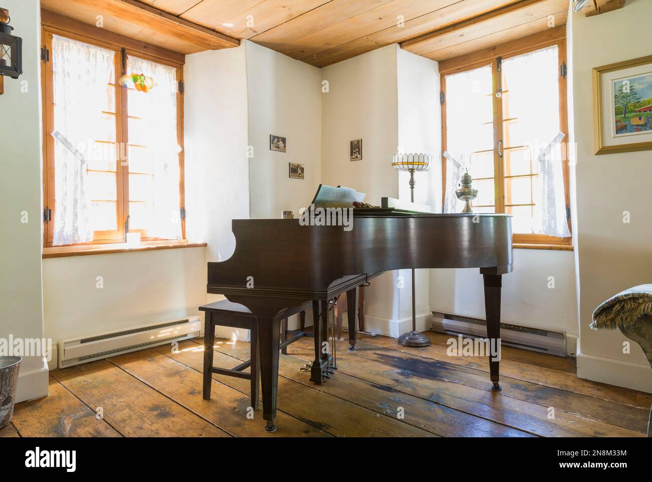 Grand piano in living room inside old circa 1760 house Stock Photo - Alamy