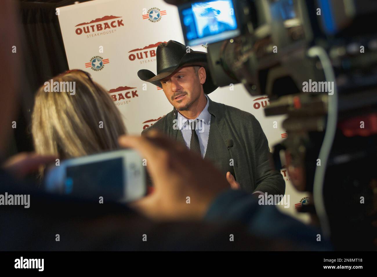Tim McGraw is interviewed at the Outback Steakhouse in Brentwood, TN
