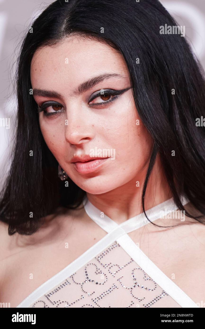 Charli XCX poses for photographers upon arrival at the Brit Awards 2023