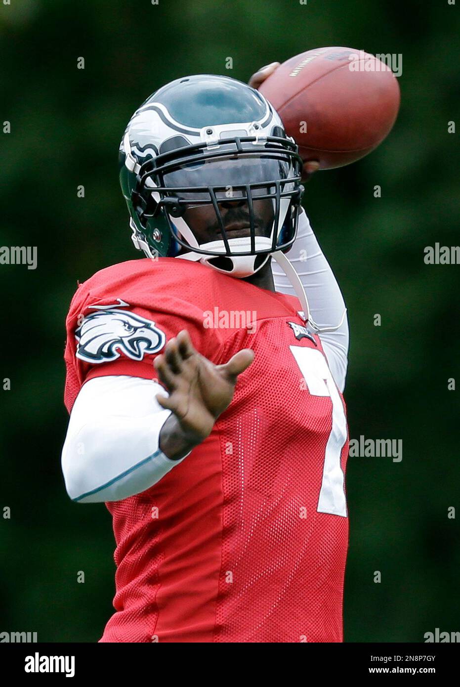 Philadelphia Eagles quarterback Michael Vick throws a pass as