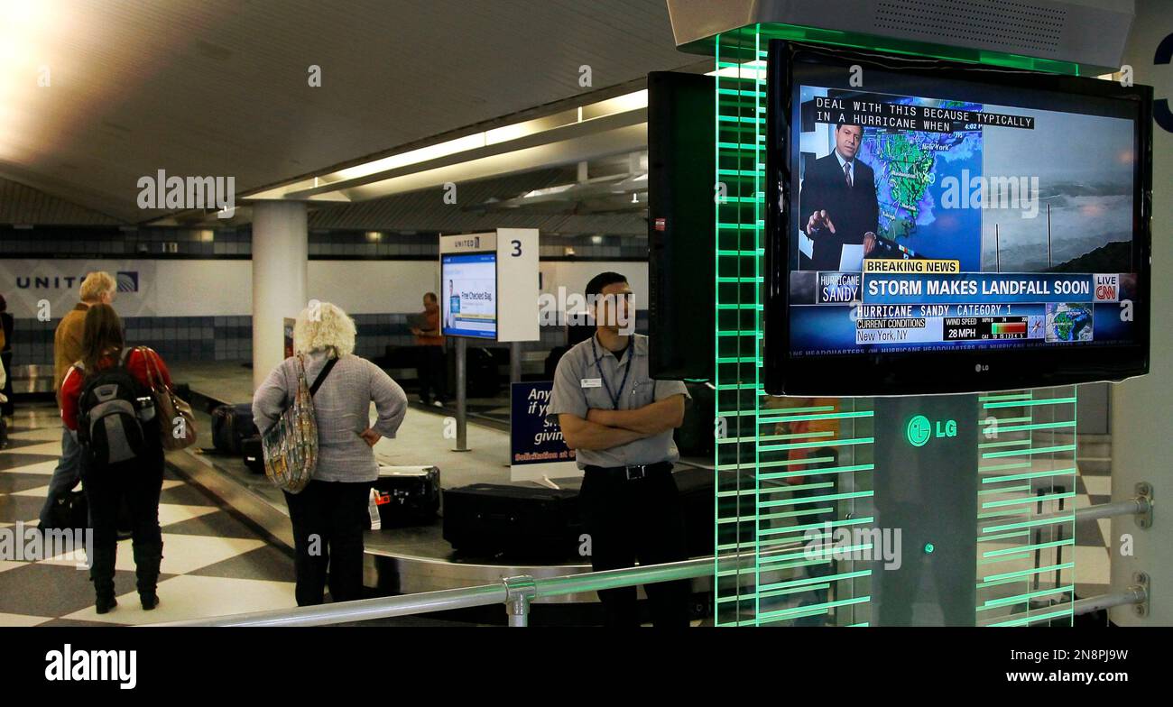 Travelers wait for their luggage at Chicago's O'Hare International