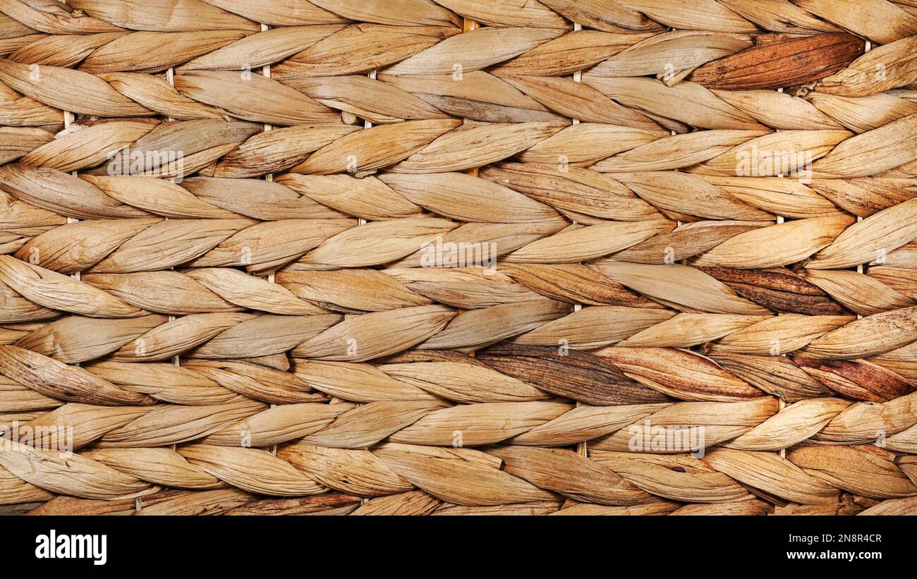 Detail of woven basket suitable for background use. 16x9 Stock Photo