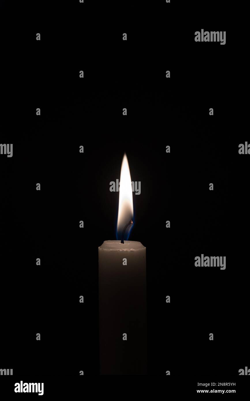 One candle light in the darkness and black room Stock Photo - Alamy