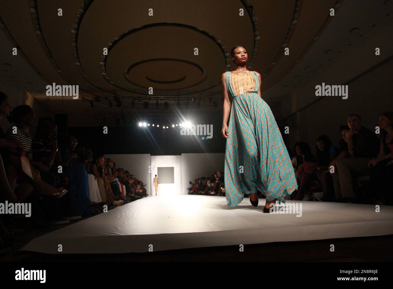A model wears an outfit by designer Tiffany Amber at the MTN Lagos ...