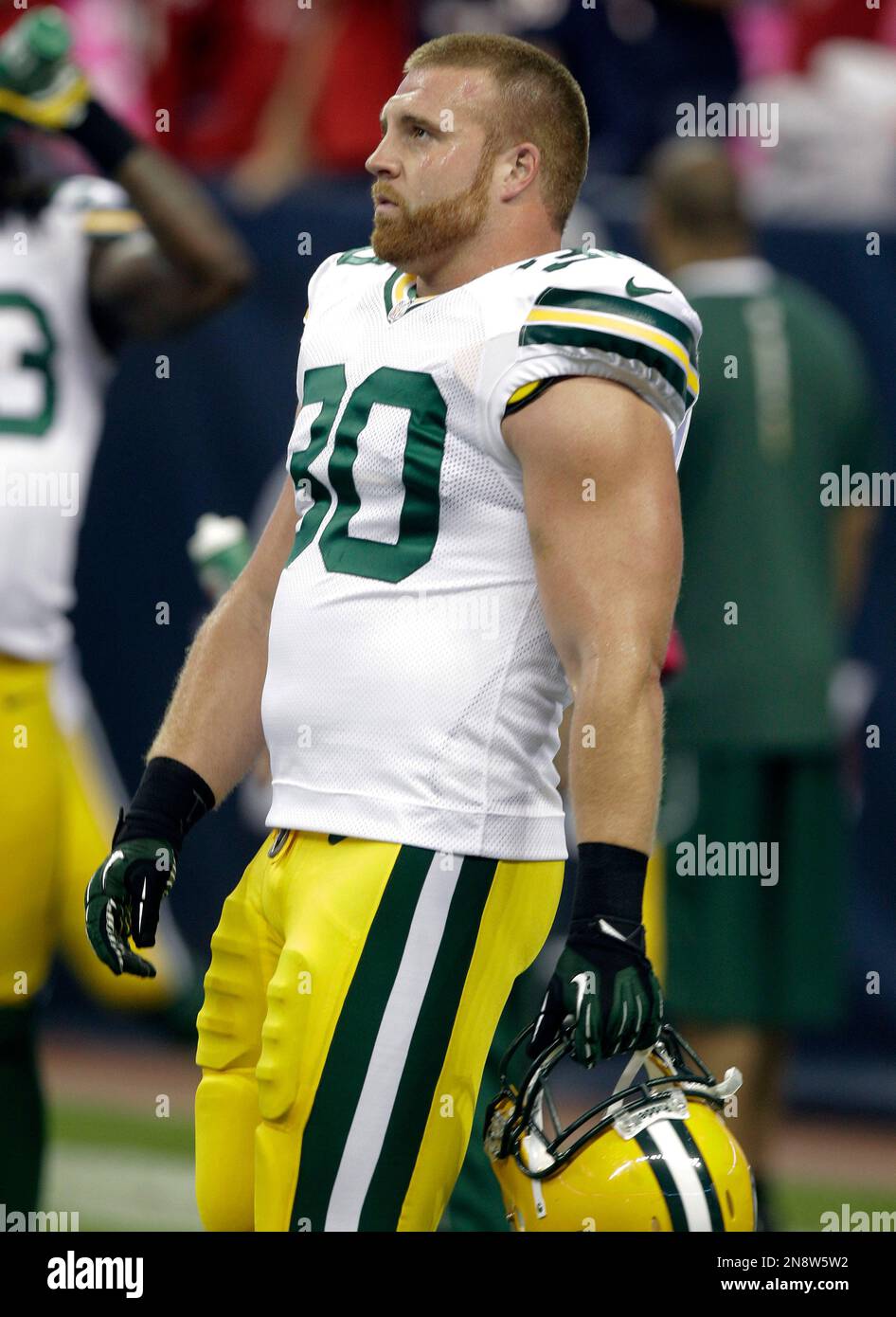 Green Bay Packers fullback John Kuhn (30) takes the field before an NFL ...