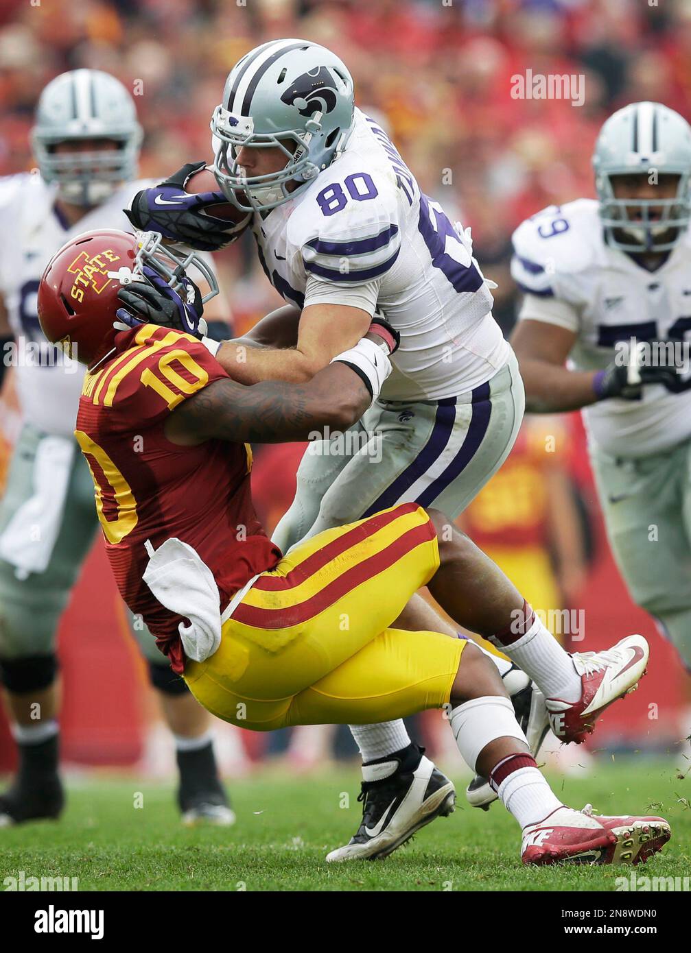 Kansas State tight end Travis Tannahill (80) runs over Iowa State ...