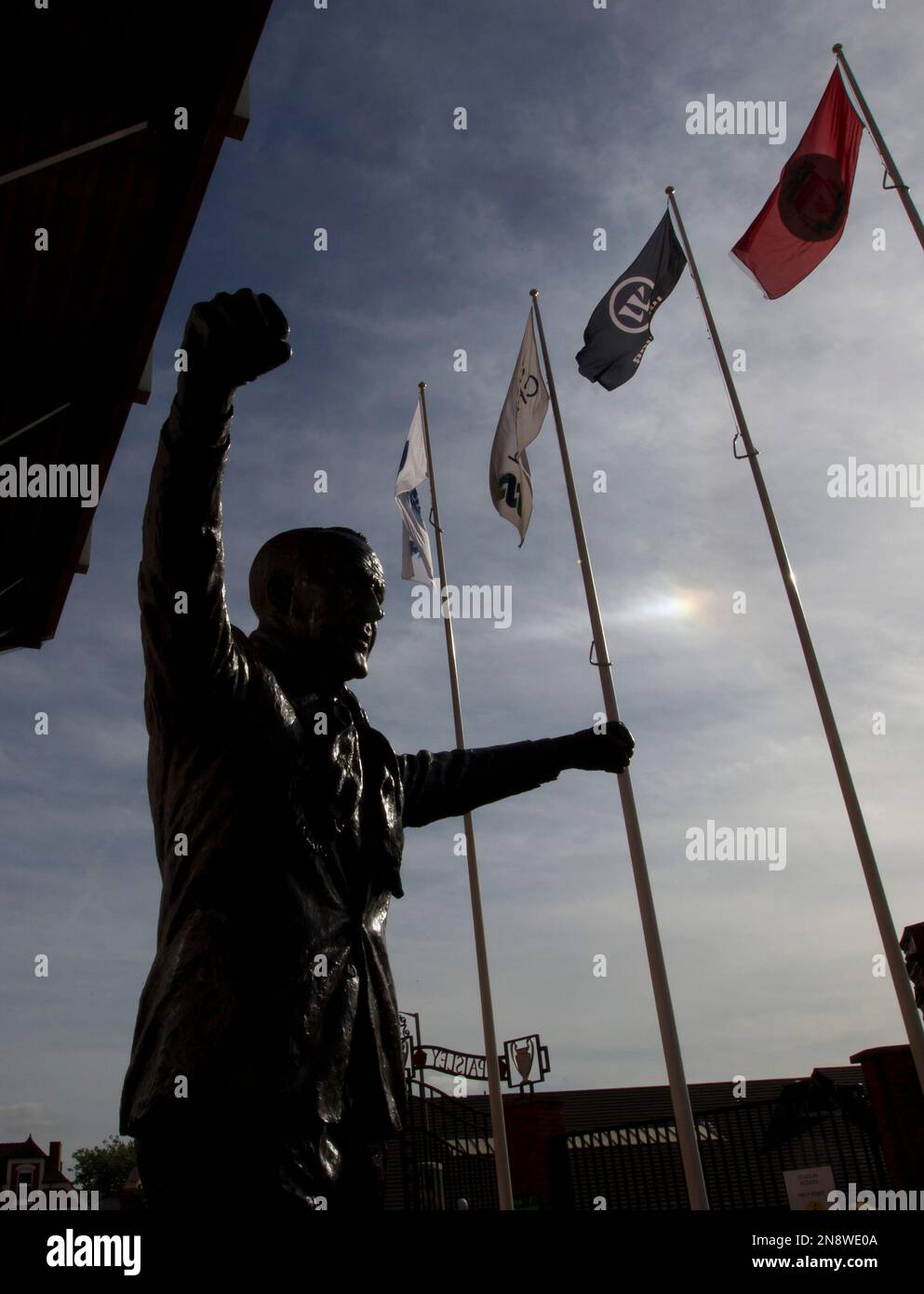 Statue of former manager Bill Shankly outside Liverpool's Anfield Stadium before the team's English Premier League soccer match against Stoke at Anfield Stadium, Liverpool, England, Sunday, Oct. 7, 2012. (AP Photo/Jon Super) Stock Photo