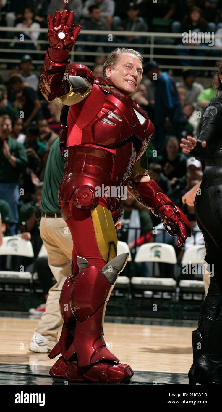 Michigan State coach Tom Izzo waves to the crowd dressed as "Iron