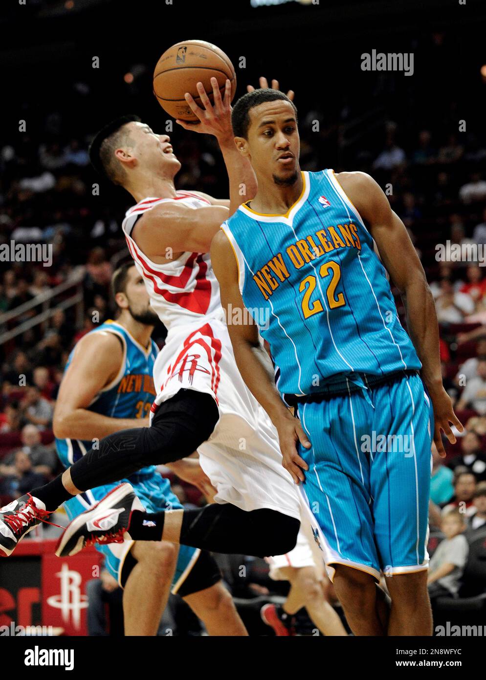 Brian Reeves Houston Rockets Houston Rockets' Jeremy Lin, left, is fouled by New Orleans Hornets ...