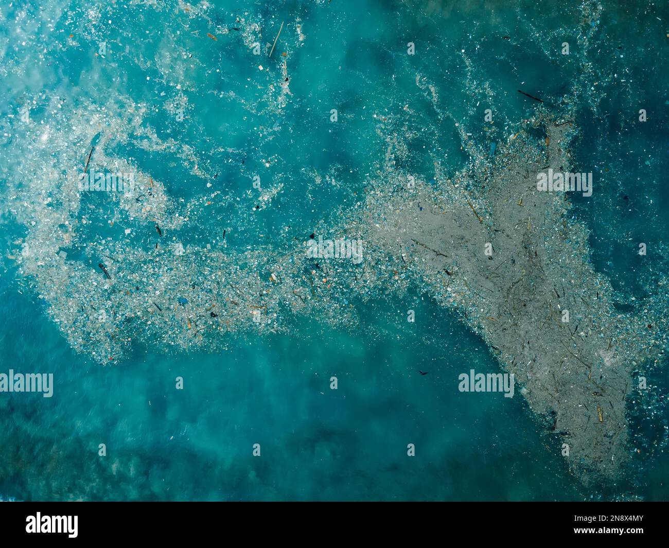 Ocean water and plastic trash island. Aerial view of pollution by