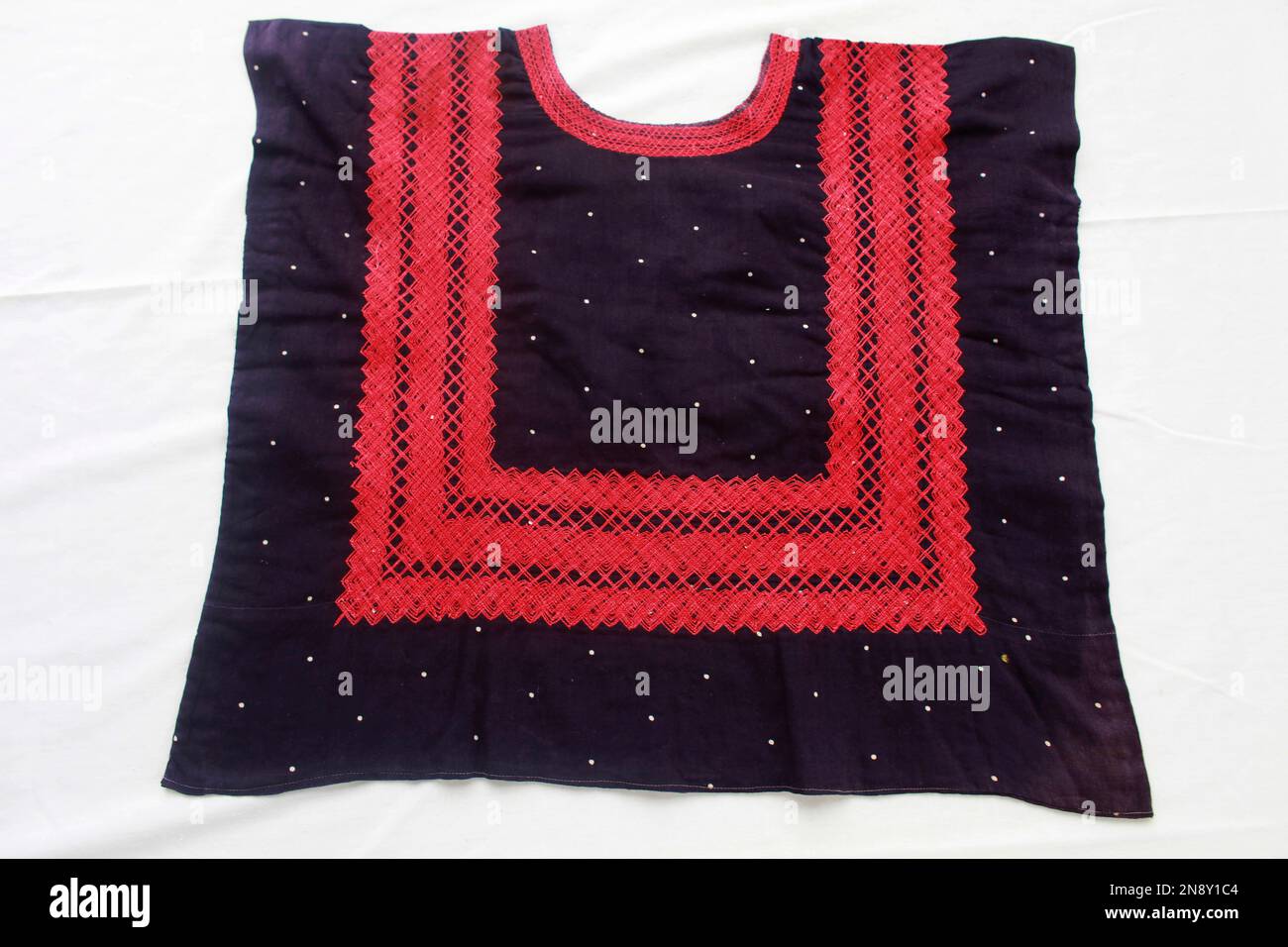 A traditional garment worn by indigenous women known as a "huipil" that