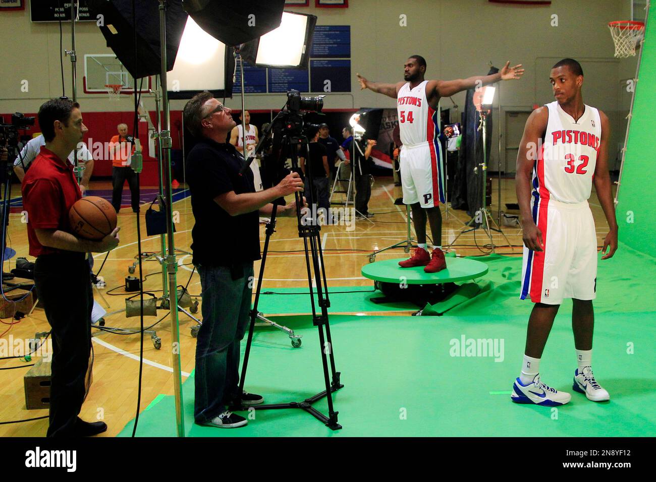 Detroit Pistons' Khris Middleton (32) and Jason Maxiell (54) pose during their NBA basketball