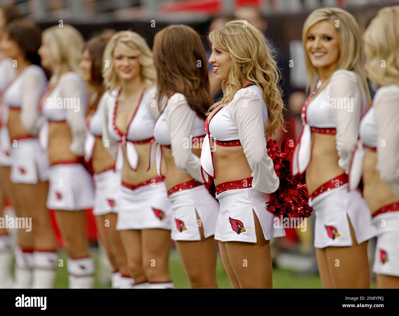 The Arizona Cardinals Cheerleaders Line Up During The First Half Of An