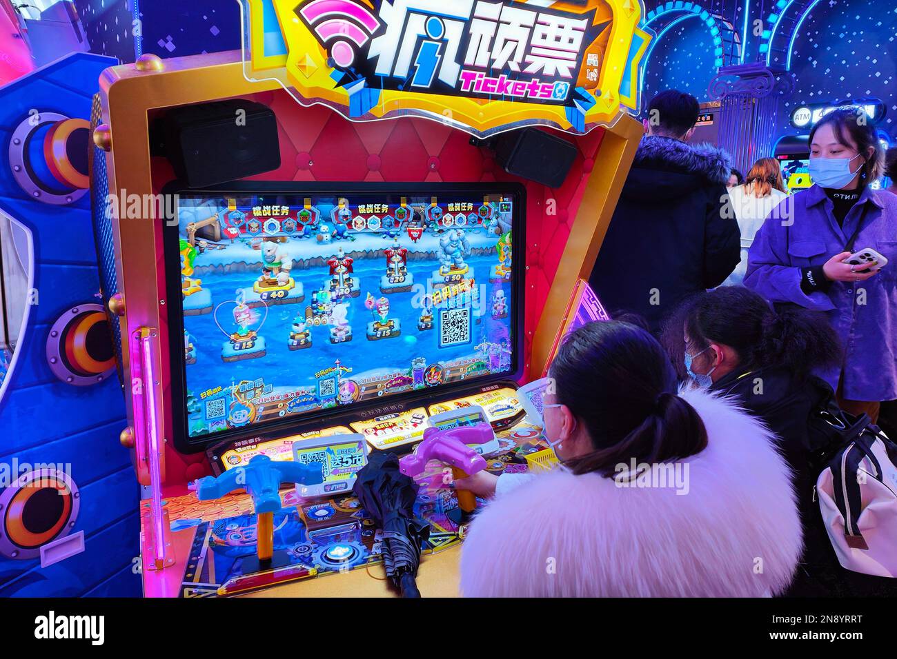 FILE--A young boy plays electronic games on an XBOX ONE game console at a  physical store of Microsoft in Shanghai, China, 26 December 2014. Produc  Stock Photo - Alamy