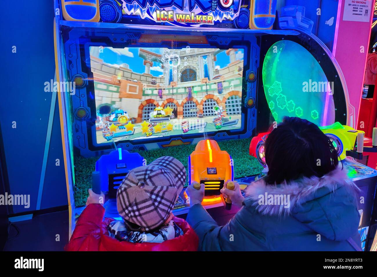 FILE--A young boy plays electronic games on an XBOX ONE game console at a  physical store of Microsoft in Shanghai, China, 26 December 2014. Produc  Stock Photo - Alamy