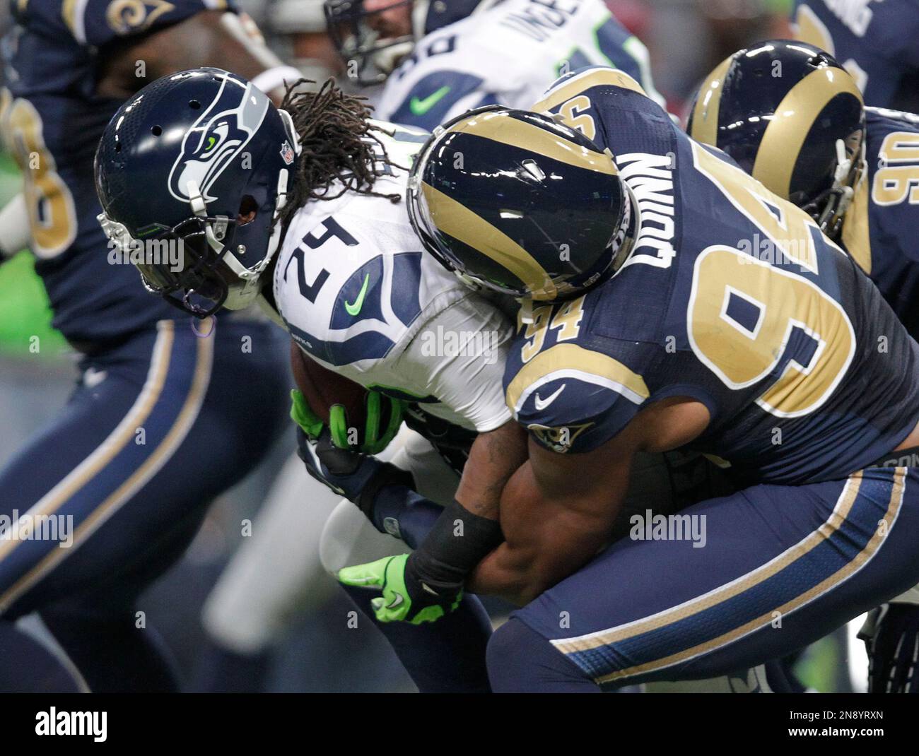 Seattle Seahawks running back Marshawn Lynch (24) is tackled by St ...