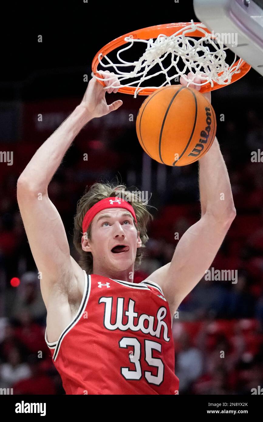 Utah center Branden Carlson dunks against Colorado during the second