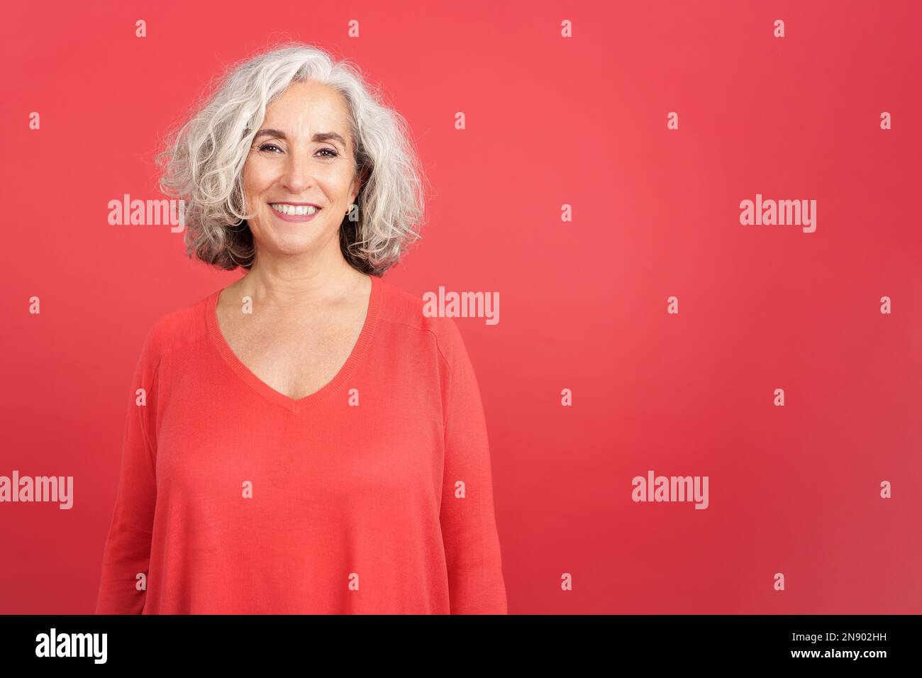 Mature woman posing for camera hi-res stock photography and images - Alamy