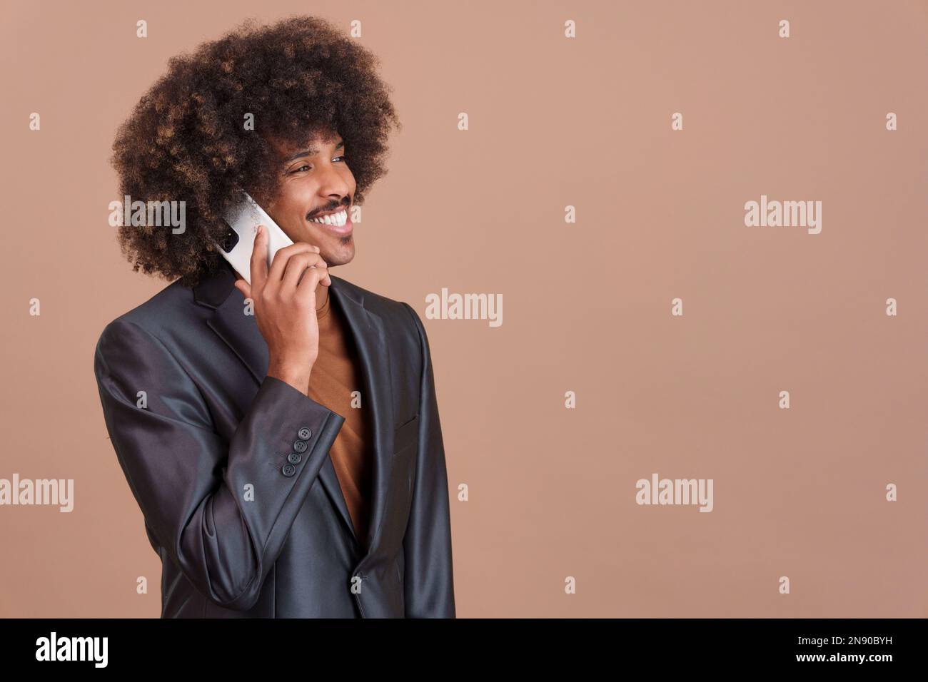 African stylish man talking to the mobile Stock Photo
