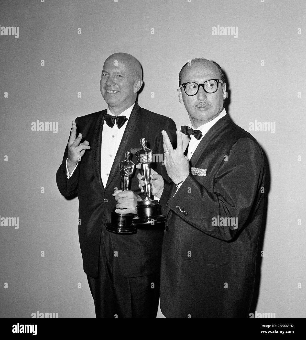 Jimmy Van Heusen, left, and Sammy Cahn hold Oscars won for the best song,  High Hopes at the Academy presentations in Hollywood, Calif. on April 4,  1960. (AP Photo Stock Photo - Alamy