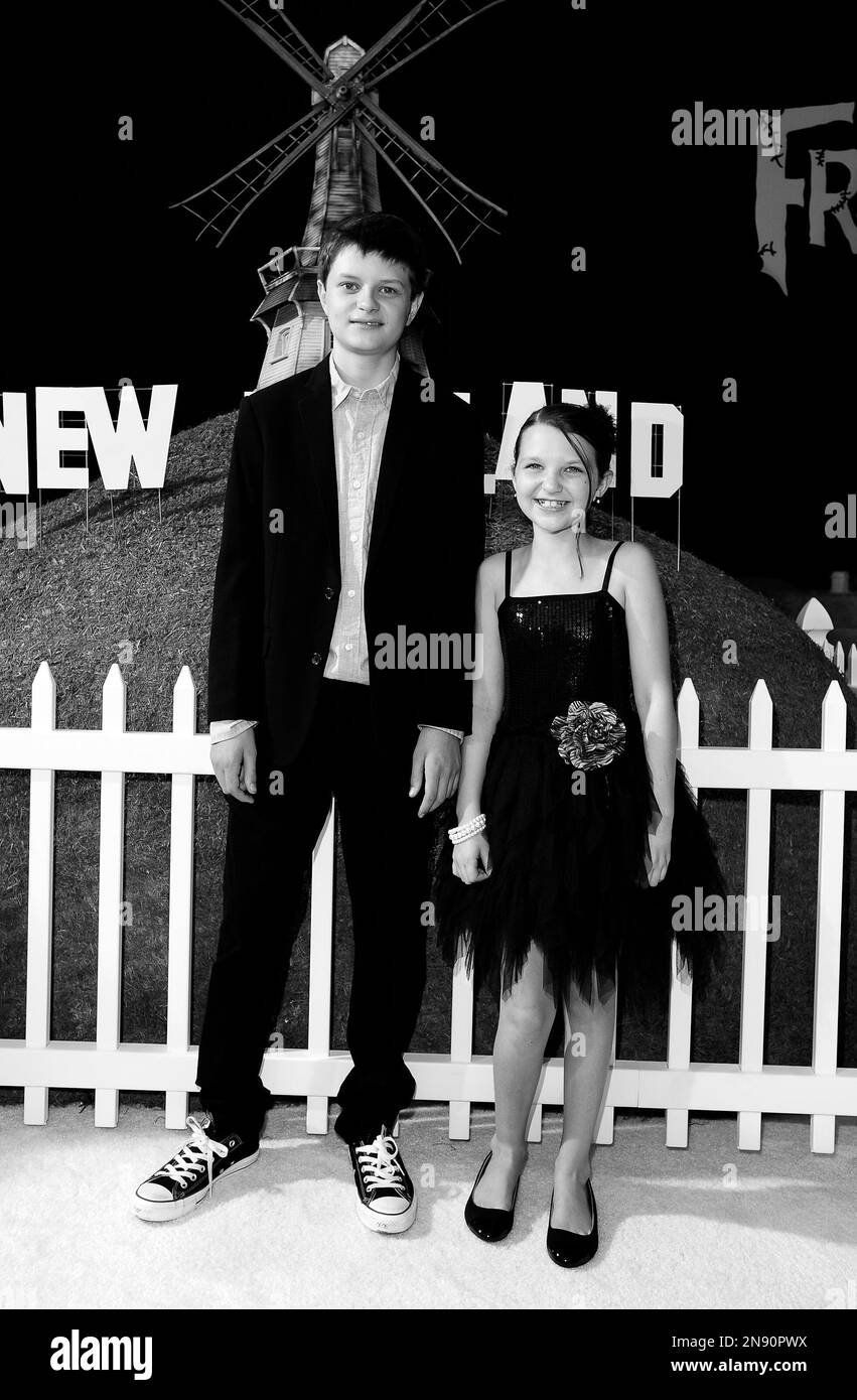 Actor Charlie Tahan, left, and sister Daisy Tahan arrive at the