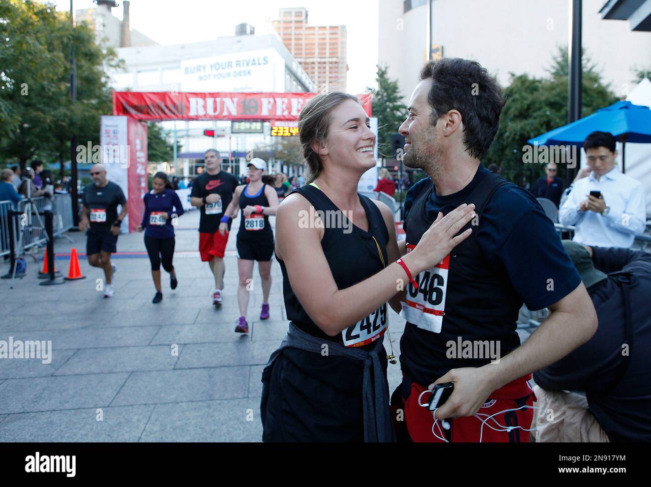 FEED CEO Lauren Bush Lauren and David Lauren celebrate their finish of