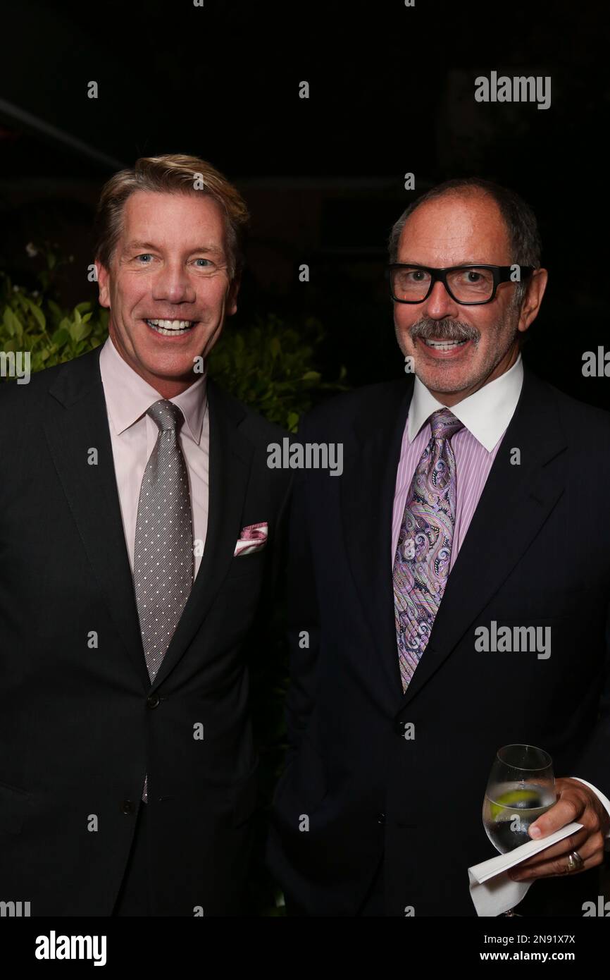 From left, Michael Moser, Harry Winston and Michael Rudder pose during the South Coast Plaza Fall Portfolio catalog launch party held at the Hotel Bel-Air on Wednesday, Sept. 19, 2012, in Bel Air, Calif. (Photo by Ryan Miller/Invision/AP) Stock Photo