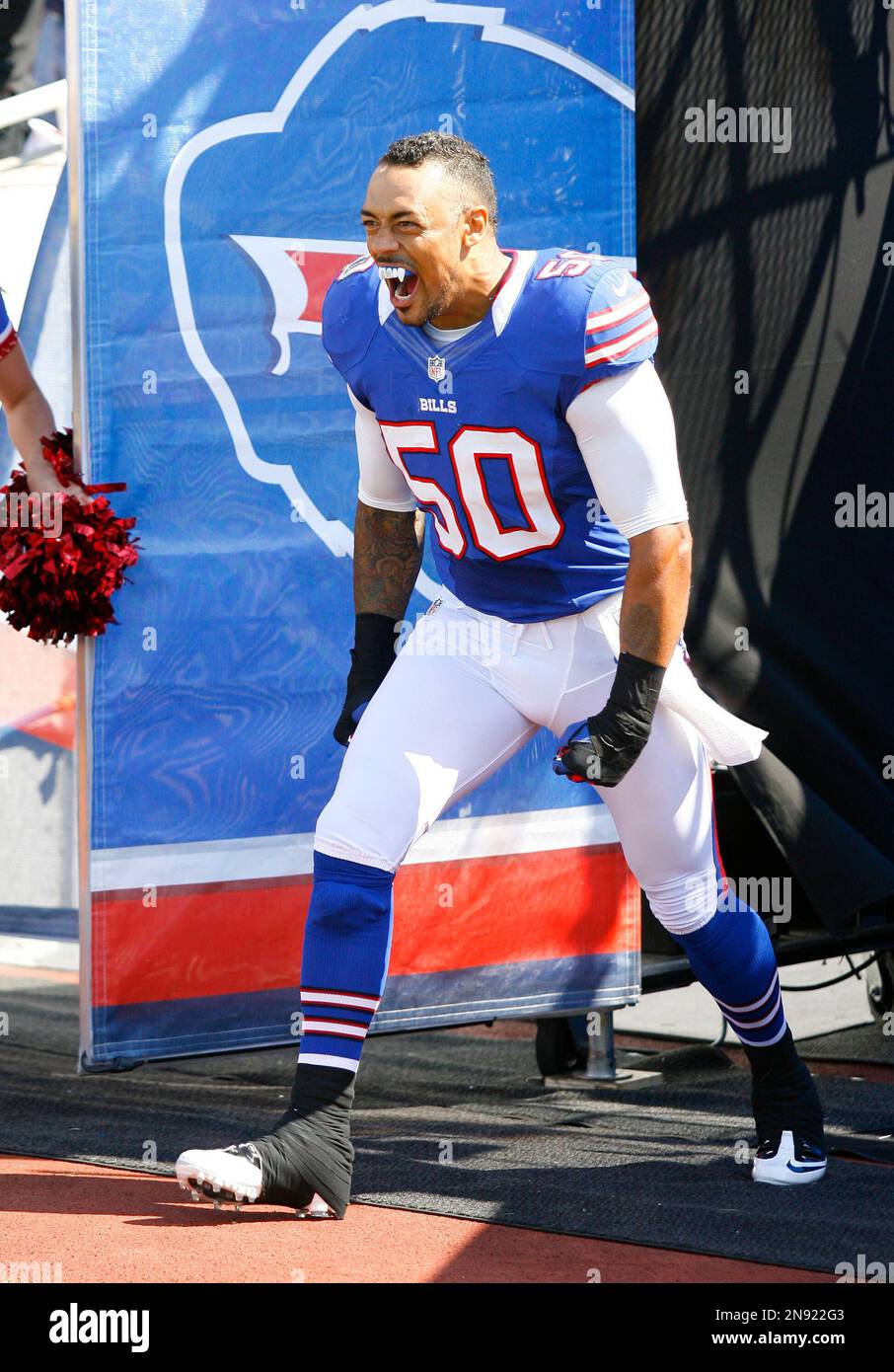 Buffalo Bills' Nick Barnett (50) steps onto the field before an NFL football game against the