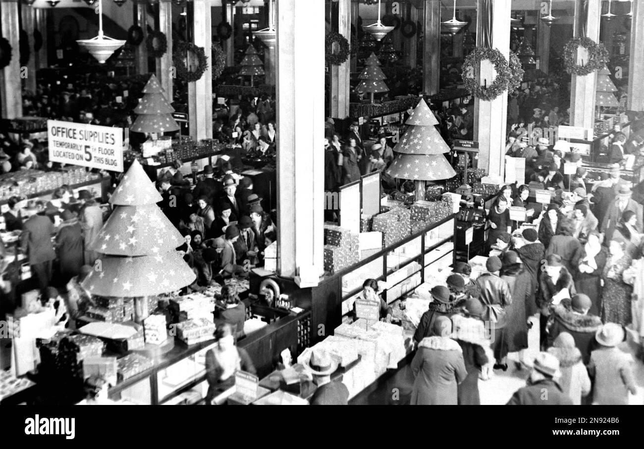 FILE In this Dec. 11, 1931 file photo, shoppers fill the ground floor at Macy’s in New York. A