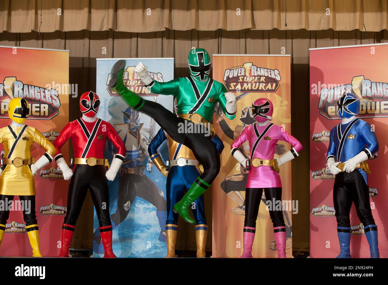 Power Rangers demonstrate moves during the Power Rangers emPOWER ...