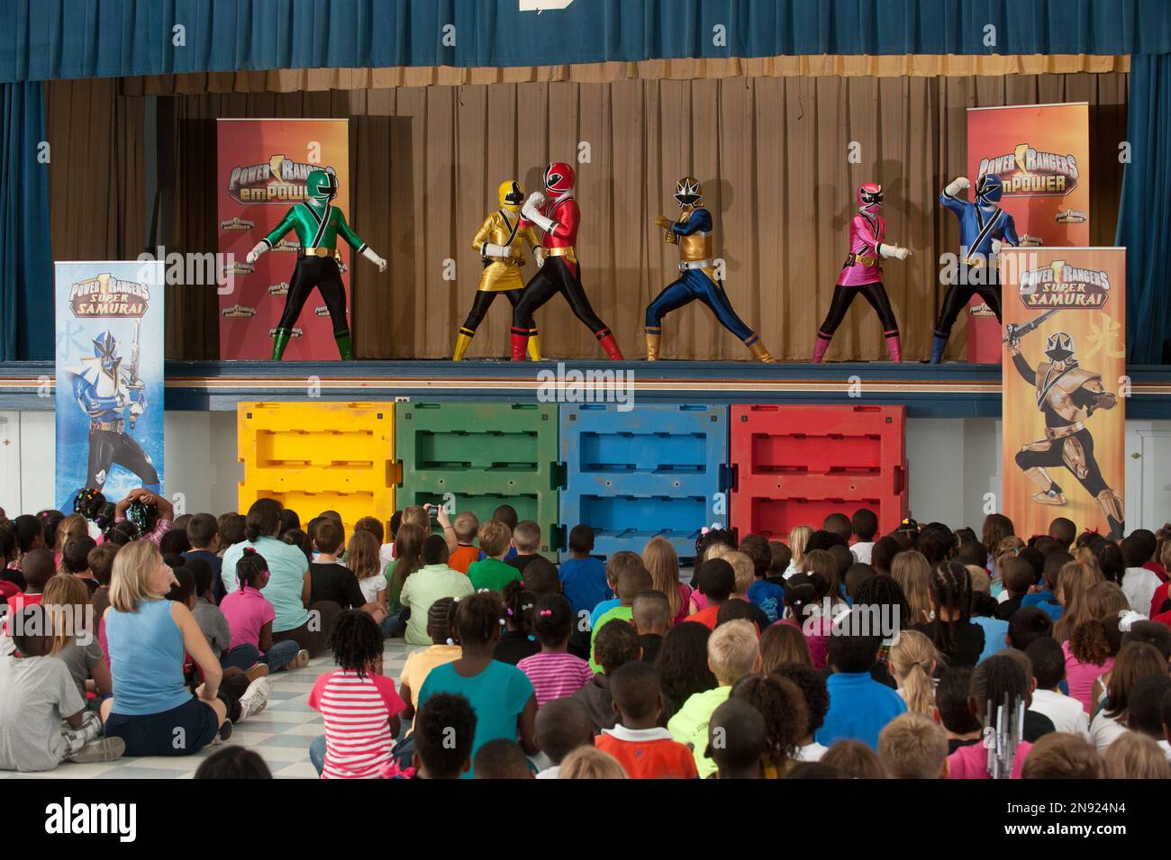 Power Rangers demonstrate moves during the Power Rangers emPOWER ...
