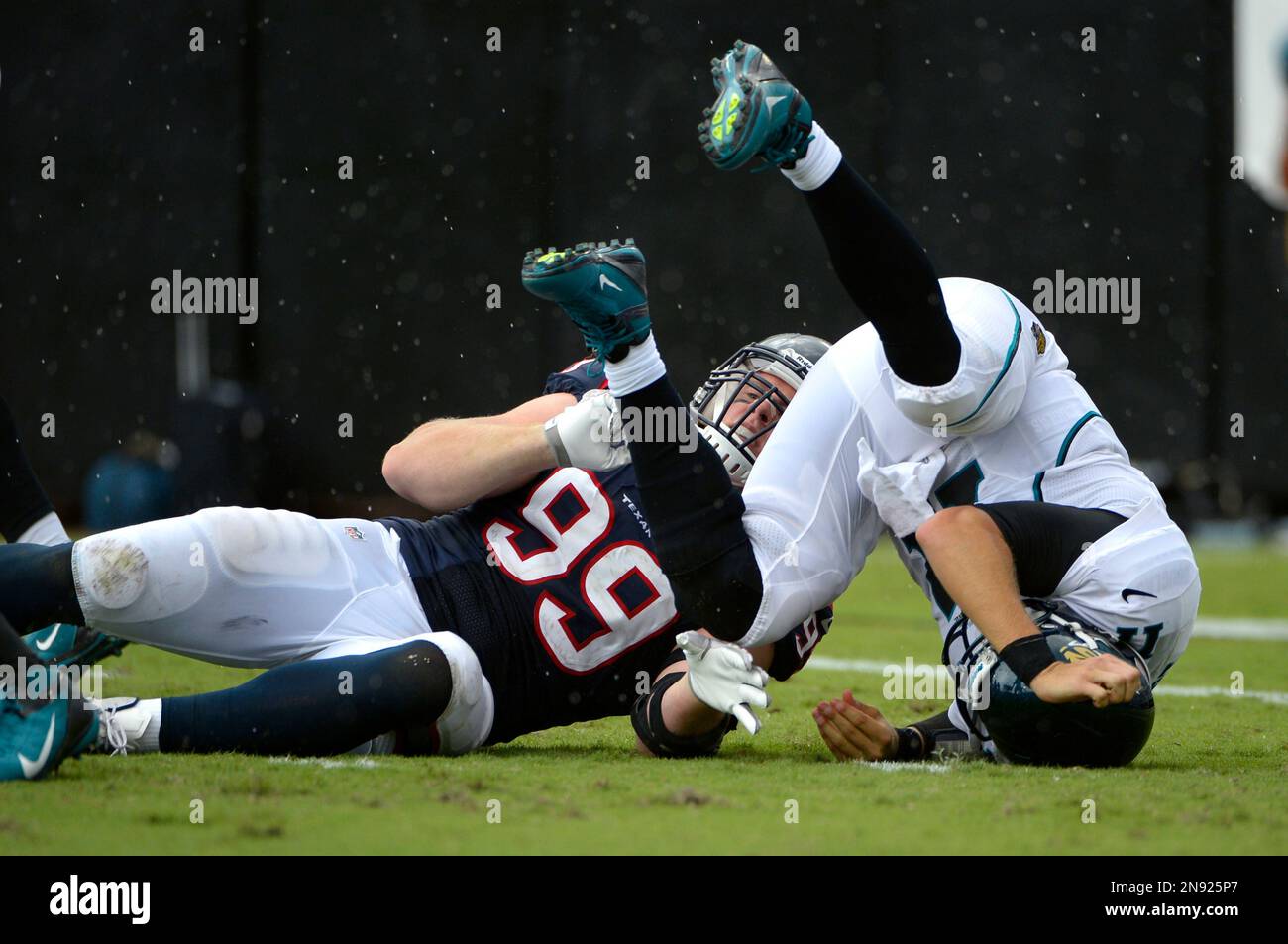 Jacksonville Jaguars quarterback Blaine Gabbert (11) is knocked down by ...