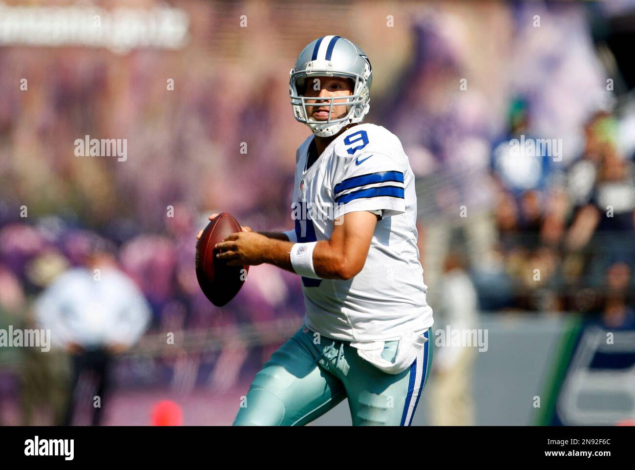 Dallas Cowboys quarterback Tony Romo looks to throw against the Seattle Seahawks in the second half of an NFL football game, Sunday, Sept. 16, 2012, in Seattle. Seattle defeated Dallas 27-7.(AP Photo/Kevin P. Casey) Stock Photo