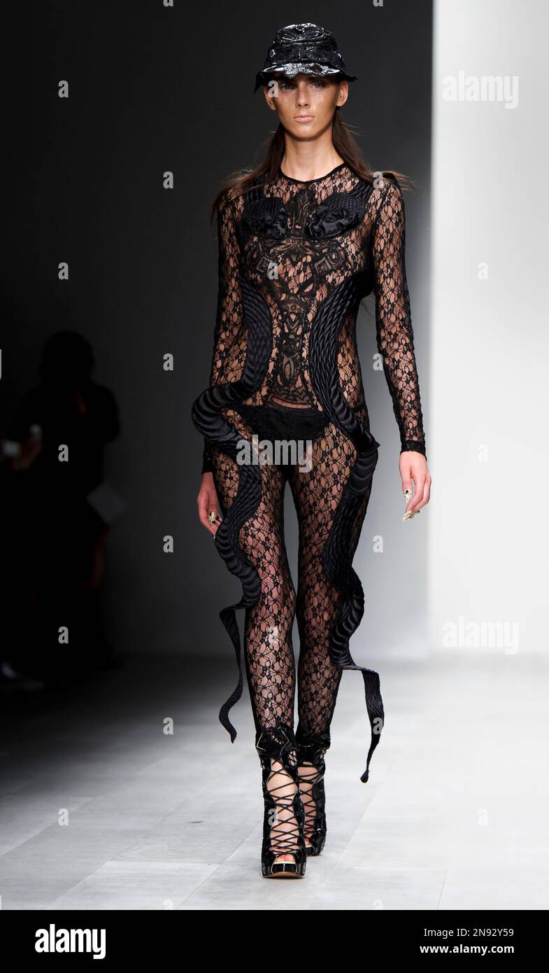 A model wears a design from the KTZ Spring/Summer 2013 collection during  London Fashion Week, Friday, Sept. 14, 2012. (AP Photo/Jonathan Short Stock  Photo - Alamy