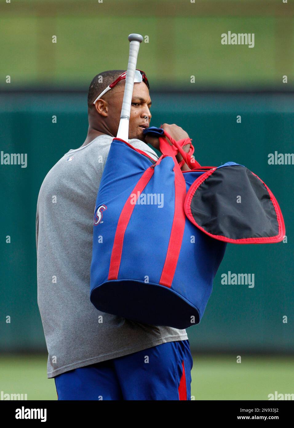 The Texas Rangers' Adrian Beltre and his son, Adrian Jr., 8, walk out for  practice in spring training in Surprise, Ariz., Thursday, Feb. 26, 2015.  (Photo by Rodger Mallison/Fort Worth Star-Telegram/TNS) *** Please Use  Credit from Credit Field *** Sto