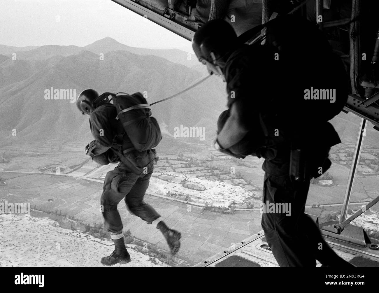 American paratrooper jumps with other buddies as U.S. forces unleashed