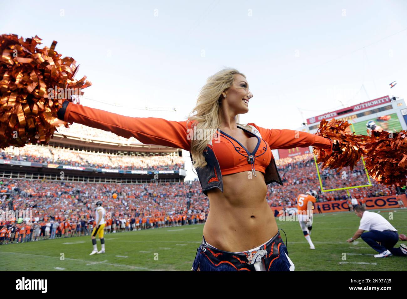 The Denver Broncos cheerleaders perform in their Christmas Holiday uniforms  at the end of the first quarter at Invesco Field at Mile High in Denver on  December 20, 2009. UPI/Gary C. Caskey