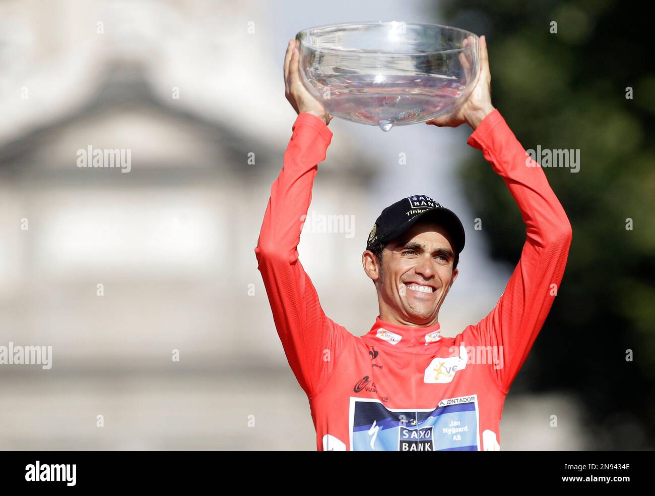Saxo Bank Team cyclist Alberto Contador celebrates at the podium