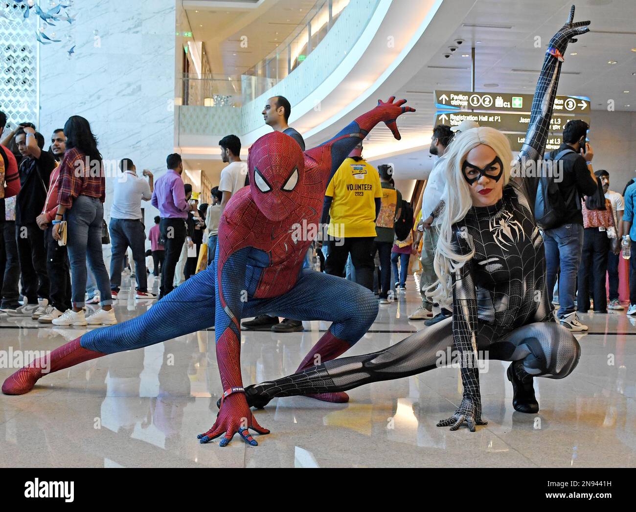 L-R) Cosplayers dressed as Spider-Man and Spider-Woman pose for a photo at  Comic Con event. The event is held again after two years gap due to corona  virus pandemic. (Photo by Ashish