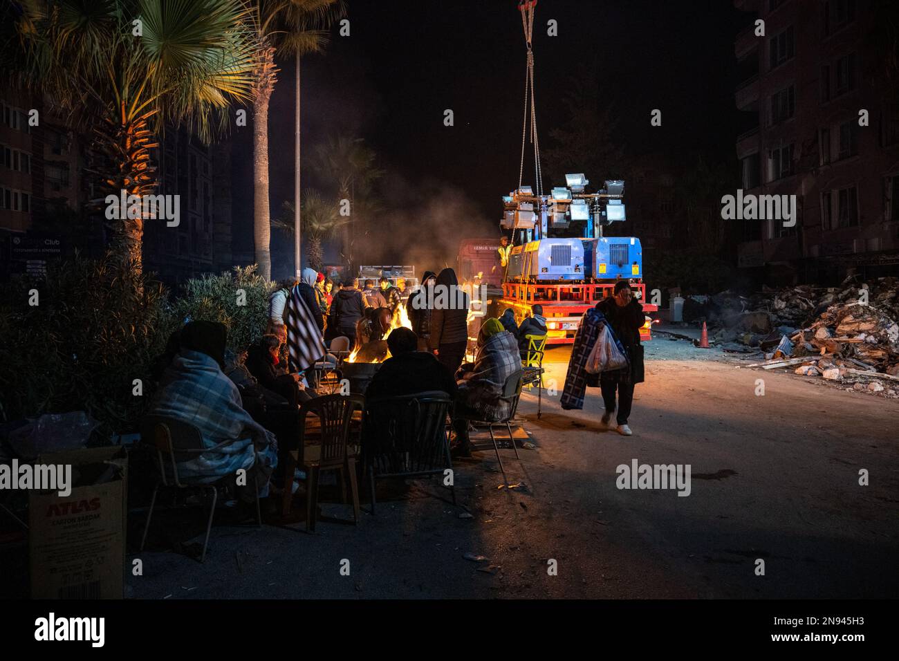 Families sleep in the street in makeshift tents or on the pavement as