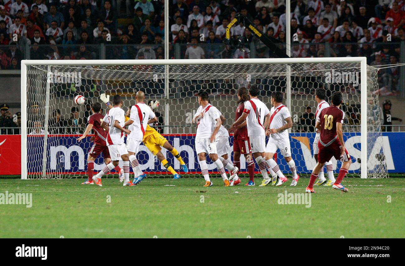 Venezuela's Juan Arango, right front, looks on after scoring against