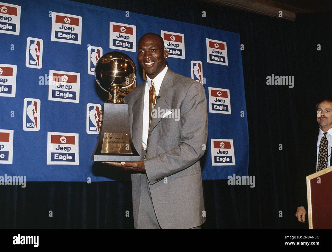 Chicago Bulls Michael Jordan holds the 1991 NBA Finals MVP trophy