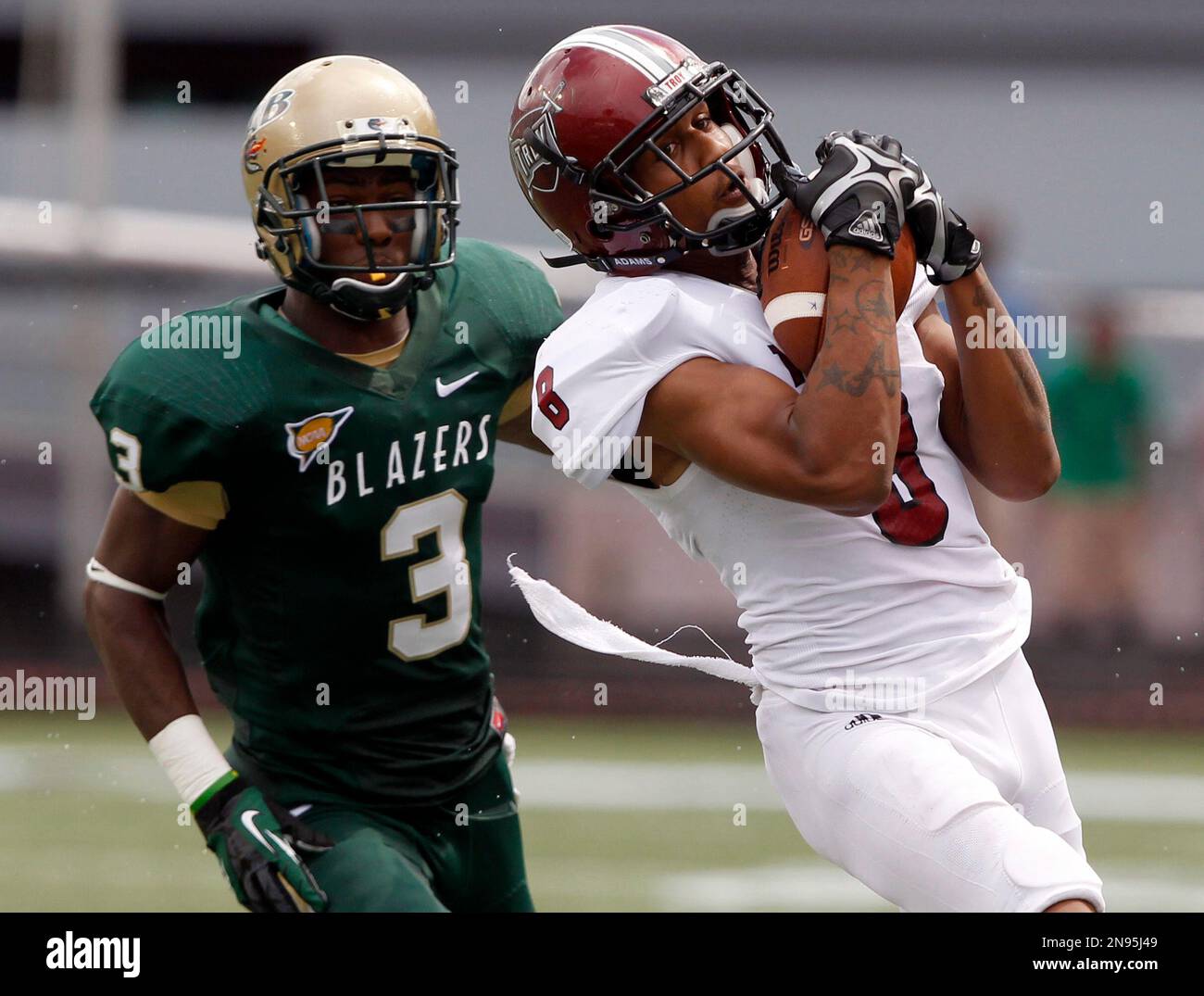 Chip Reeves Troy wide receiver Chip Reeves (8) catches the ball as UAB safety ...