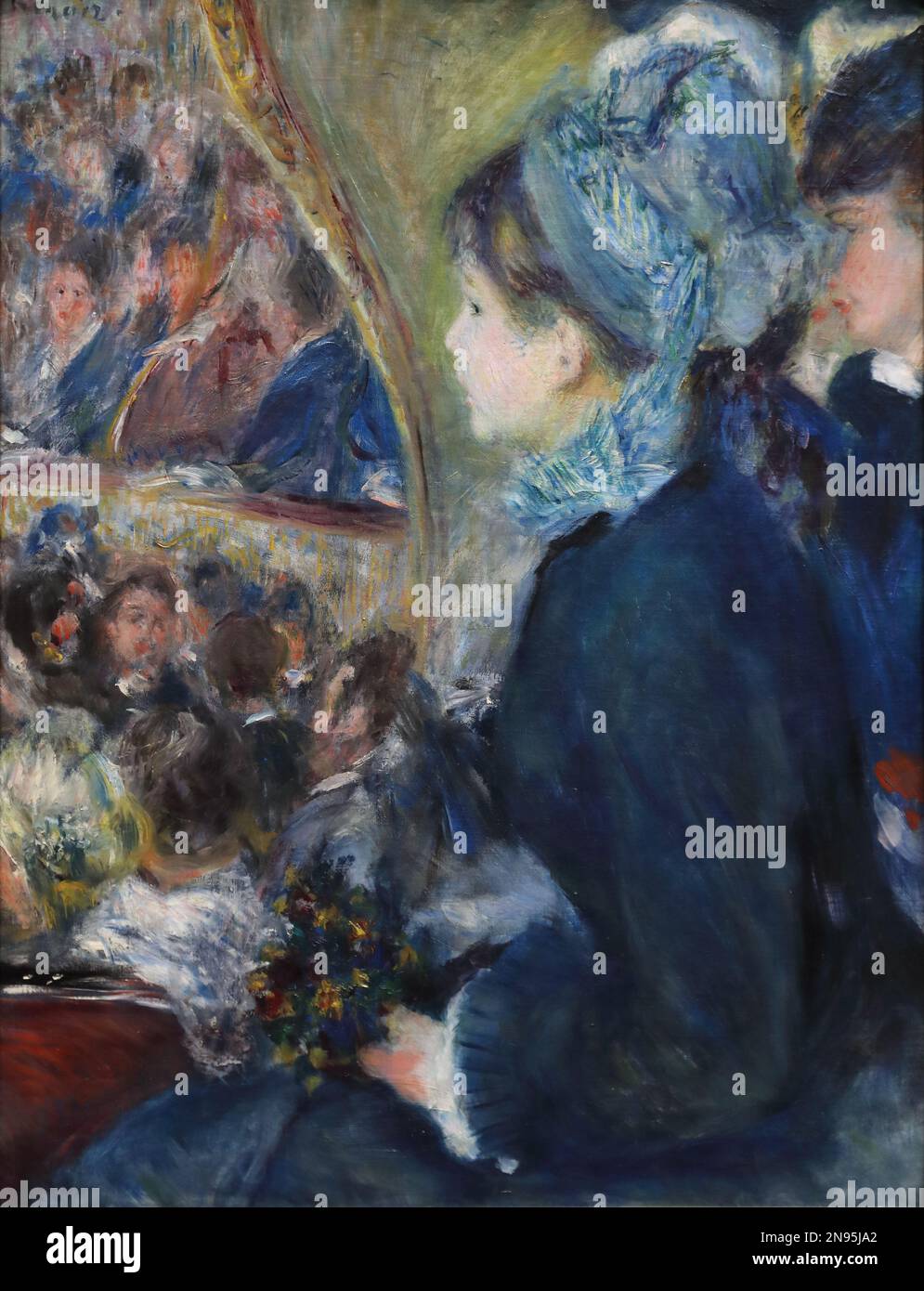 At the Theatre (La premiere sortie) by French Impressionist painter Pierre-Auguste Renoir at the National Gallery, London, UK Stock Photo