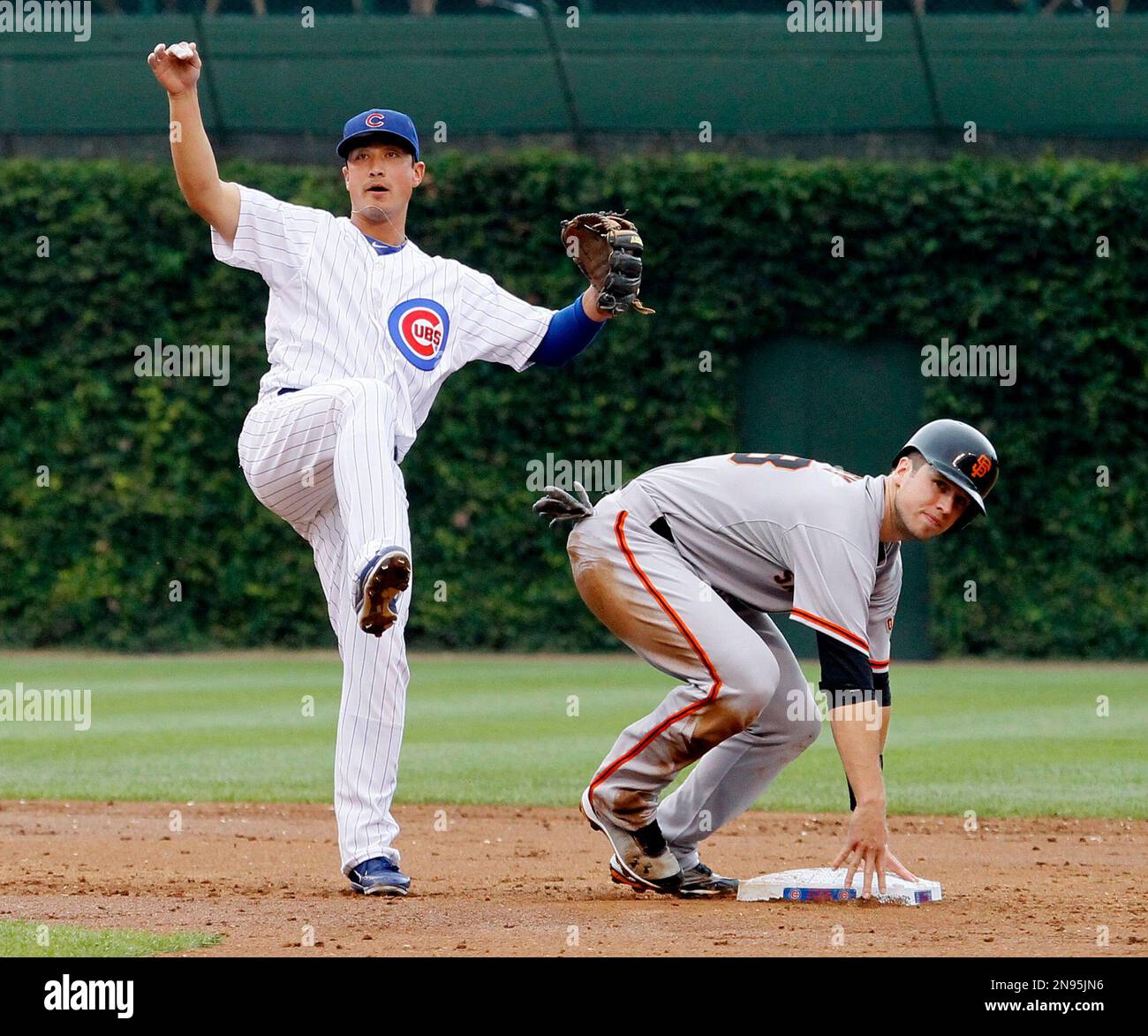 Chicago Cubs second baseman Darwin Barney, left, and Buster Posey ...