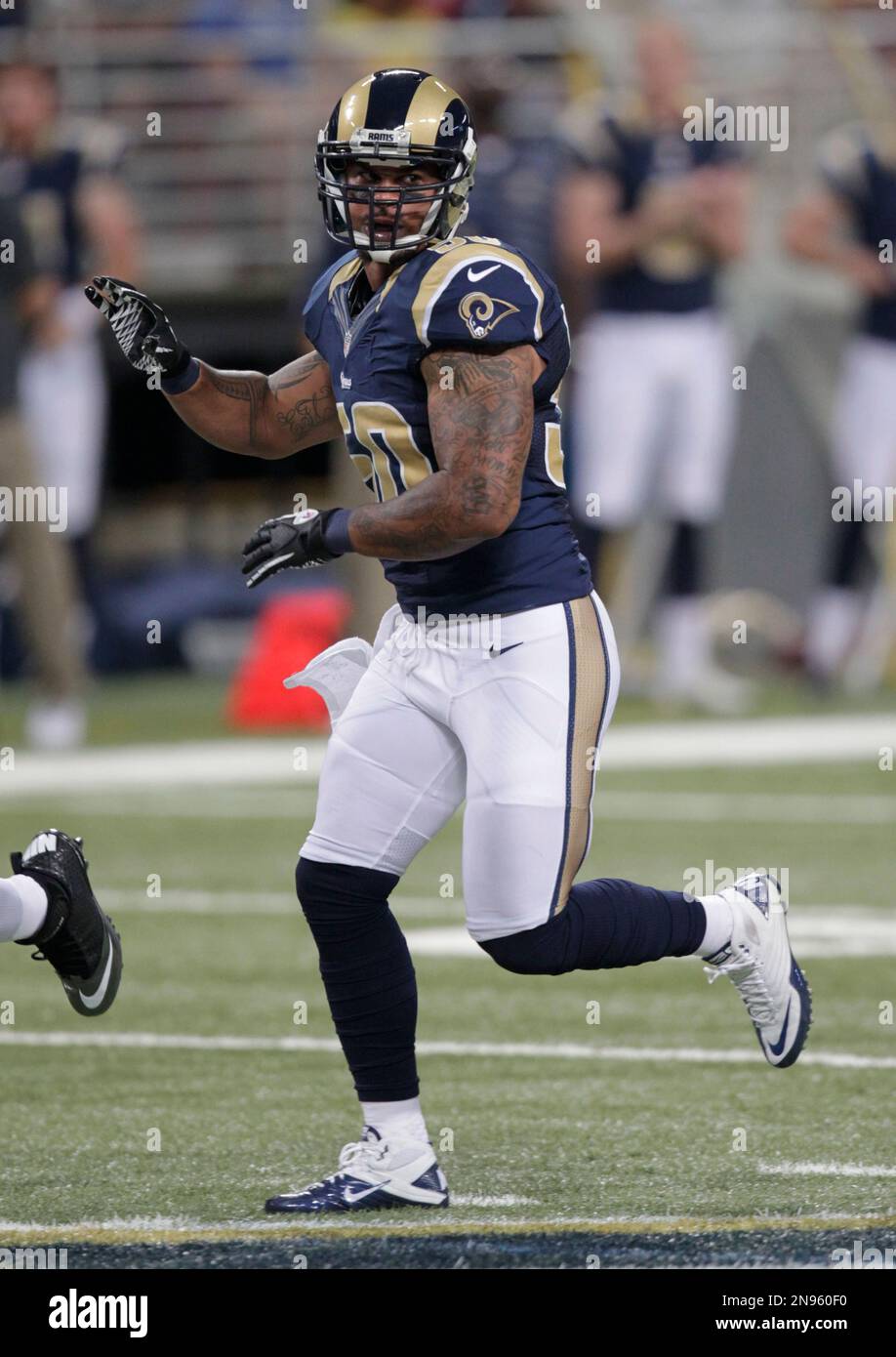 St. Louis Rams linebacker Aaron Brown takes up his position during the ...