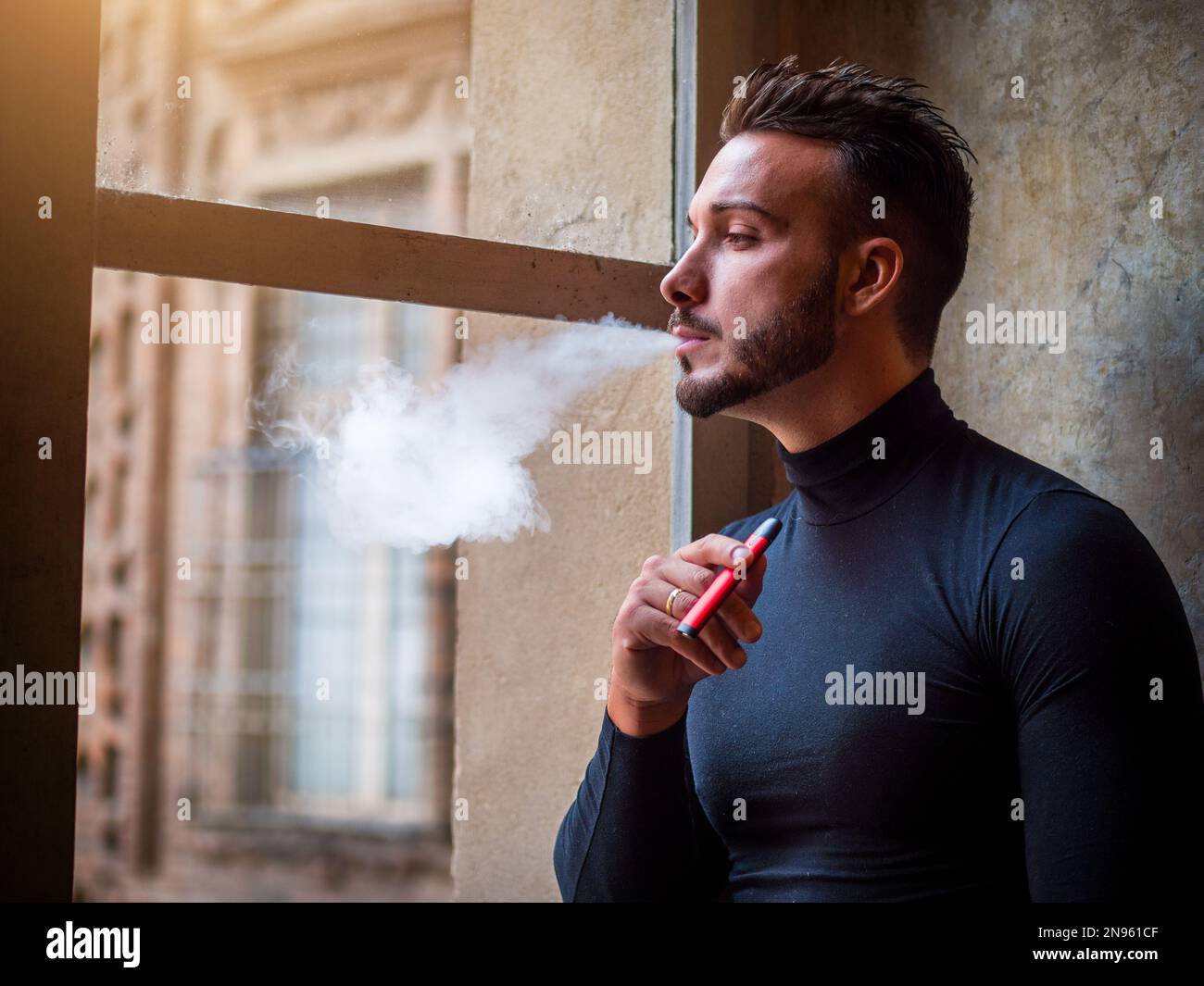 Person smoking e cigarette hi-res stock photography and images - Alamy