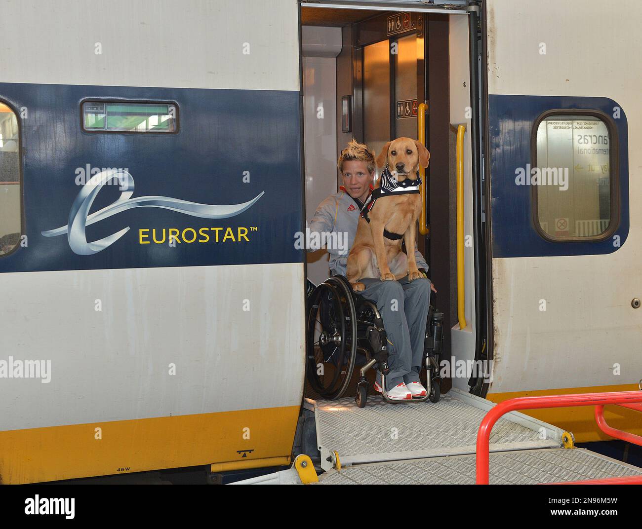 Belgian wheelchair sprinter Marieke Vervoort and dog Zenn arrive on