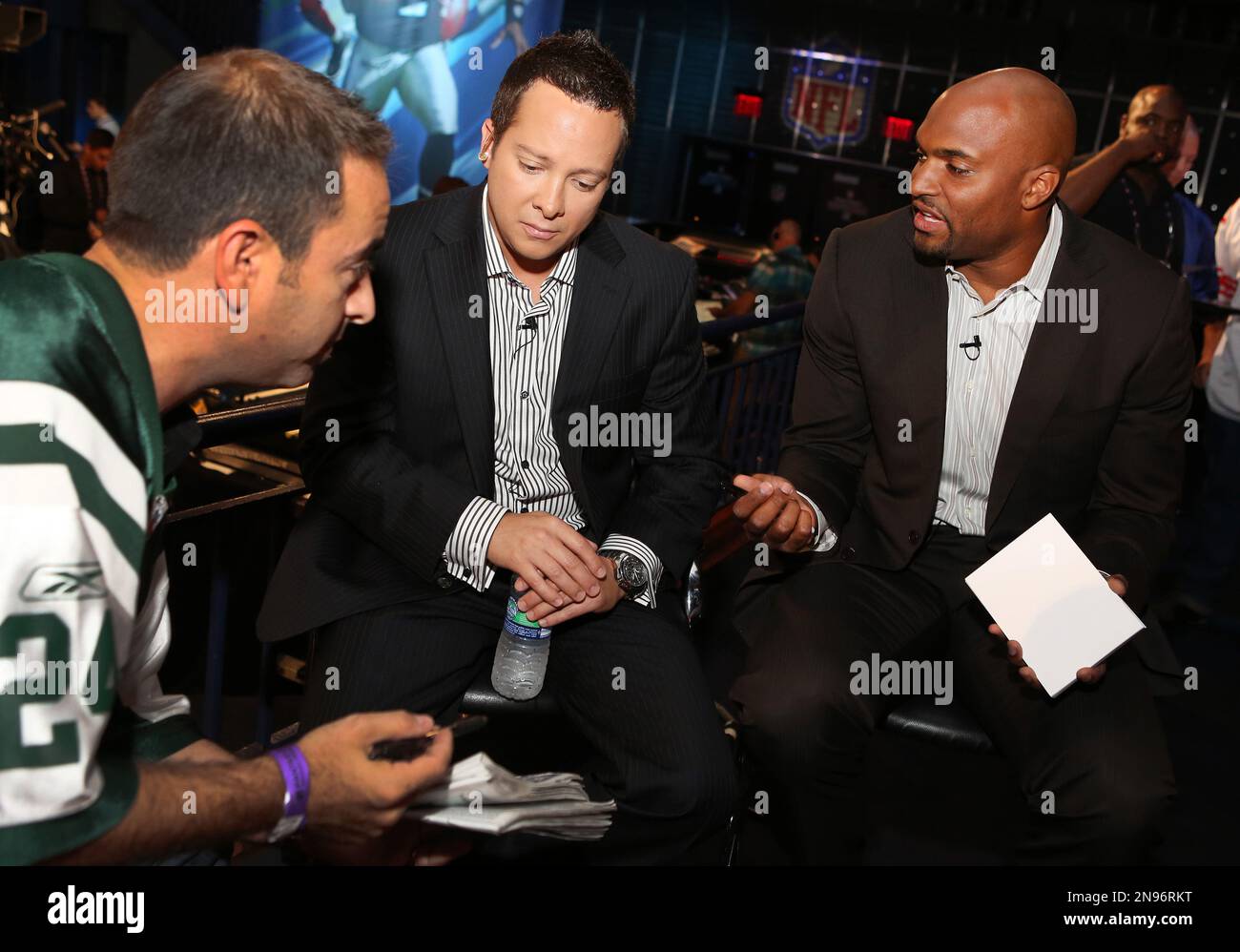 Michael Fabiano, left, and former NFL wide receiver Amani Toomer are seen  during the DirecTV NFL Fantasy Week on Friday, Aug. 24, 2012 at the Best  Buy theatre in Times Square in