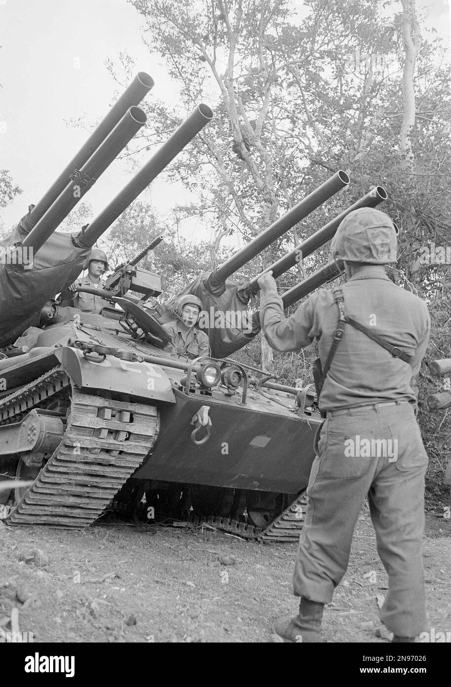U.S. Marines maneuver their Ontos antitank weapon into a wooded